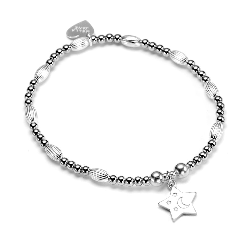 Sterling silver round and oval beaded bracelet, featuring an embossed star charm, displayed on a white background