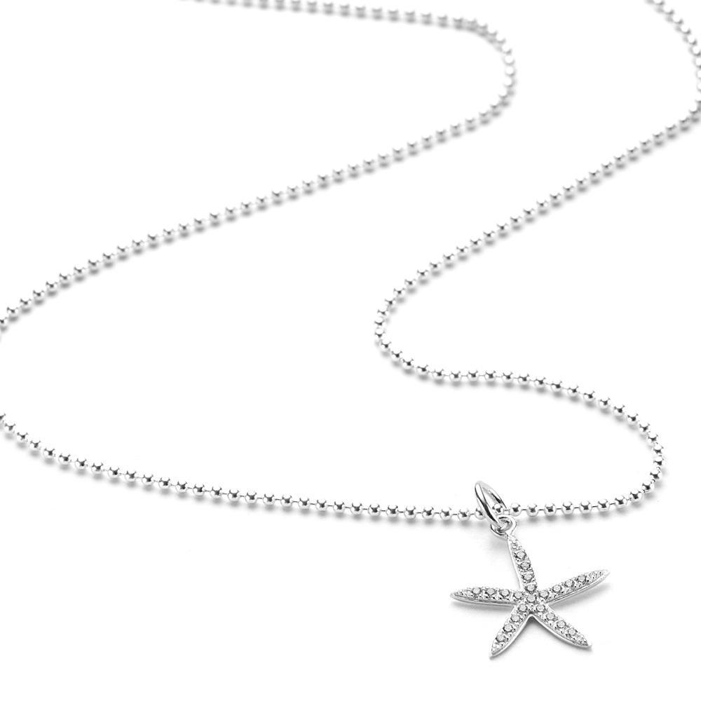 A sterling silver fine bead chain necklace with a sterling silver and cubic zirconia starfish pendant.