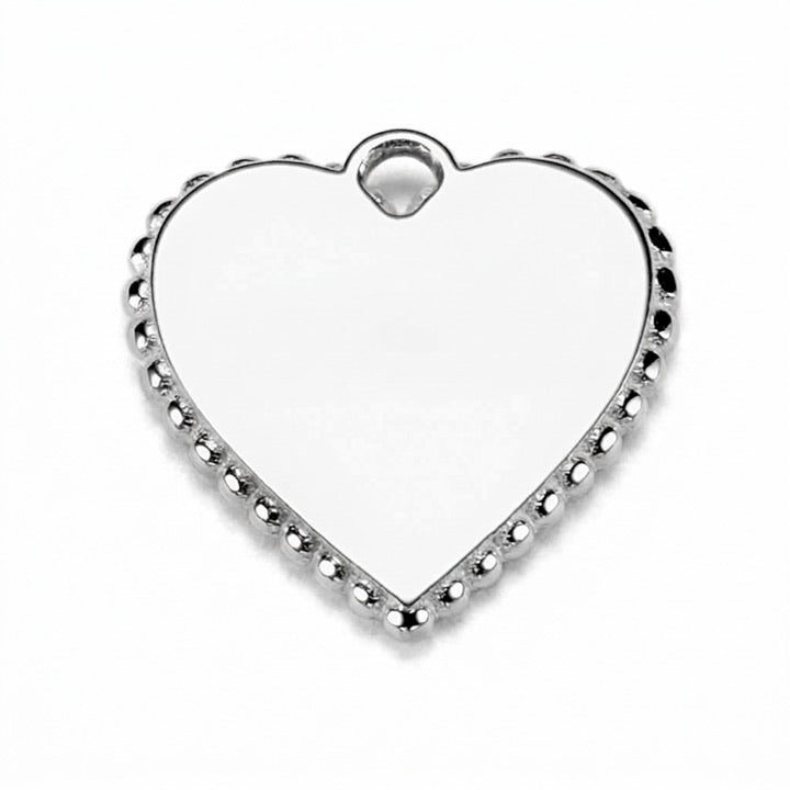The back of the charm, where your engraving goes